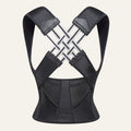 Ceinture lombaire noire en nylon et spandex de Reprogrammer Boutique, avec soutien croisé pour la posture.