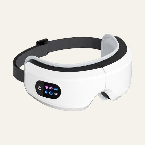 Masseur ocular branco Reprogrammer Boutique com pressão de ar, vibração e calor para alívio de tensões.